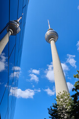 Fototapeta premium 19 August 2024 Berlin (Germany) - August 2024: panorama of the Alexanderplatz in Berlin against blue sky.