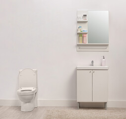 Bathroom with a toilet and sink