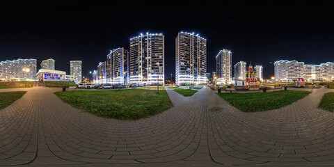night panorama 360 near skyscraper multistory buildings with illumination of residential quarter...