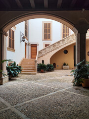 Arch and courtyard of a house in Palma de mallorca