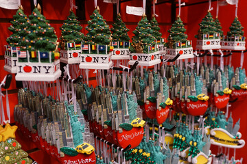 New York City, NY:  A large array of New York-themed holiday ornaments on display in a store.