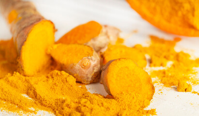 turmeric chopped and scattered on the kitchen counter