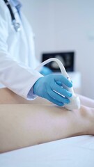 Male doctor with blue protective gloves using ultrasound machine on the knee of a female patient....