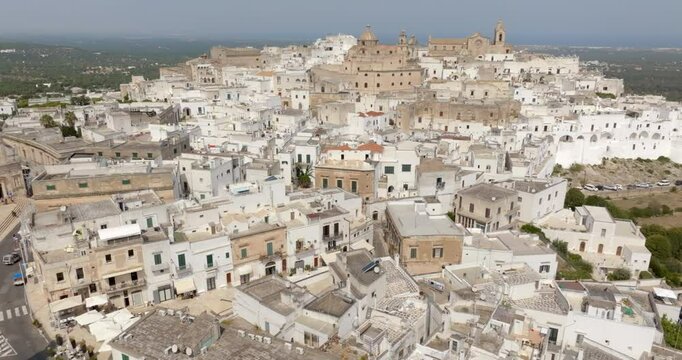 Aerial view of the historic center of Ostuni, also known as The White Town. The Old Town is located on a hill in the province of Brindisi, in Puglia, Italy. 