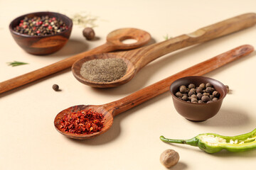 Composition with different fresh spices on color background