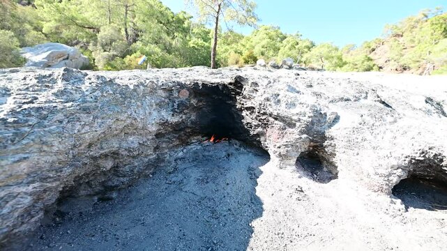  Natural flames emerge from rocks at Yanartas in Antalya&rsquo;s Olympos National Park, an ancient site with continuous fires fueled by natural gas.