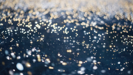 A mesmerizing close-up of shimmering bokeh lights against a dark background, creating a dreamy and enchanting atmosphere filled with depth and sparkle.