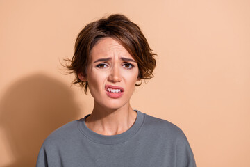 Photo portrait of attractive young woman skeptical distrust grimace wear trendy gray clothes...