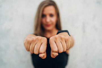 Young woman doing shadow boxing training outdoor