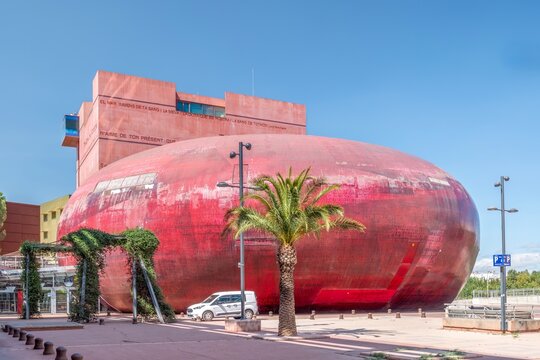 Perpignan Archipel Theater Modern Red Round Building Architecture In The City Of Perpignan, France, Occitanie. Modern Architecture