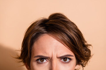 Cropped photo portrait of lovely young lady angry look hide face isolated on beige color background