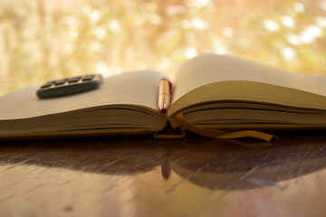 Business plan. Close-up view of calculator, notepad and pencil
