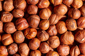 Scattered Peeled Hazelnut - Top View. Background from Hazelnuts. Natural High-Calorie Snacks