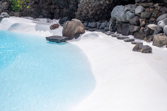Amazing pool, salty lake designed by Cesar Manrique in volcanic lava tunnel called Jameos del Agua in Lanzarote, Spain