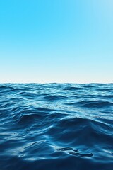 Fototapeta premium Calm Blue Ocean Waves Under Clear Sky