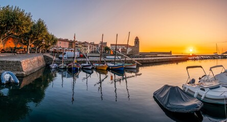  Traditional Catalan Fishing Boats In The Harbor Of The City Of Collioure, With The Church Of...