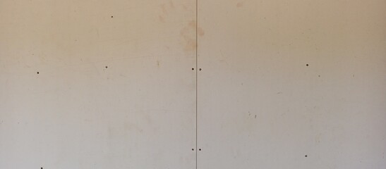 plasterboard wall with joints and screws on the construction site