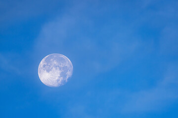 Fullmoon on blue sky at morning