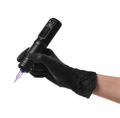 Professional artist in gloves holding tattoo machine on white background, closeup