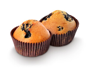 Tasty blueberry muffins in cupcake liners isolated on white