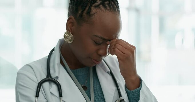 Stress, doctor and black woman in hospital with anxiety for medical crisis, emergency and patient loss. Healthcare, clinic and person with worry, unhappy and upset for burnout, mistake and frustrated