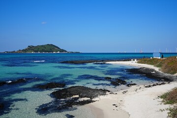 fine seaside view with clear shoaling beach