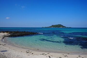 crystal clear water and far island