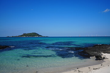 crystal clear water and far island