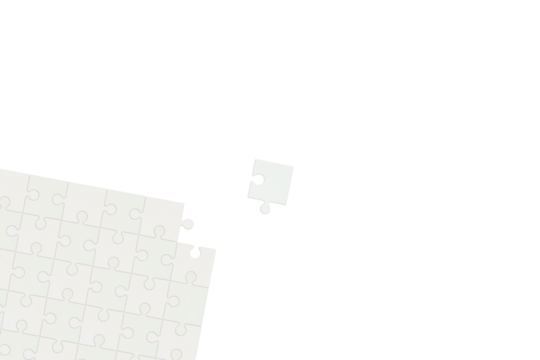 斜めになったジグソーパズルの角がとれた1ピースが中心にある背景素材