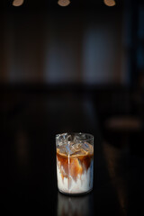 glass of coffee with milk on the table
