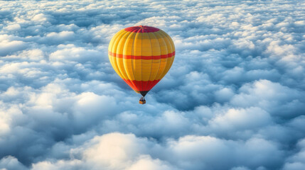 Fototapeta premium colorful hot air balloon floating above clouds creates serene and breathtaking scene. vibrant colors contrast beautifully with soft, fluffy clouds below, evoking sense of adventure and tranquility