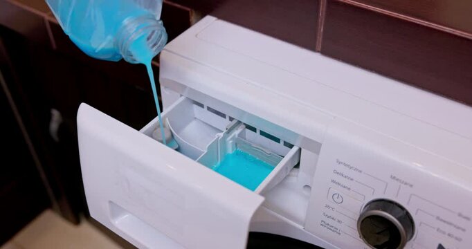 The process of adding laundry detergent to a washing machine is important for clean clothing
