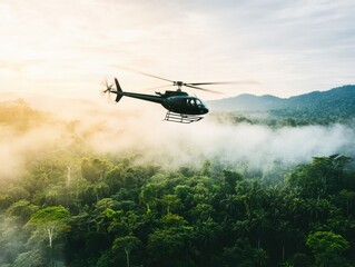 Fototapeta premium A helicopter flying above a lush green forest, surrounded by mist and mountains, capturing the beauty of nature from above.
