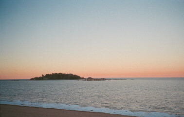sunset at the beach with island in Michigan