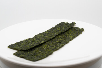 Organic seaweed sheets stacked for a healthy snack.