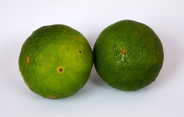 photo of fresh green lime, on white background