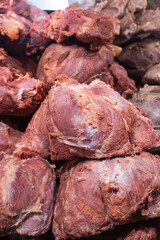 whole piece of beef in the supermarket.