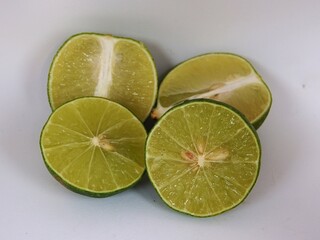photo of fresh green lime, on white background