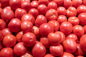 fresh ripe red tomatoes in market.