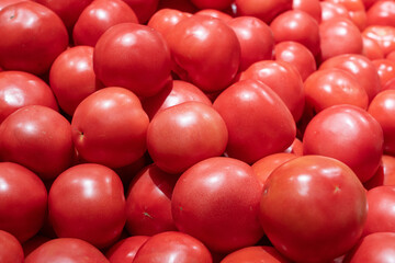 fresh ripe red tomatoes in market.