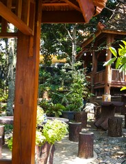 photo of a park with lots of trees and gazebos, cool and fresh