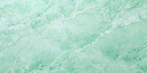 Obraz premium Fresh mint green wallpaper with a subtle texture resembling natural stone, minimalist interior, home office decor, soothing colors, organic aesthetic
