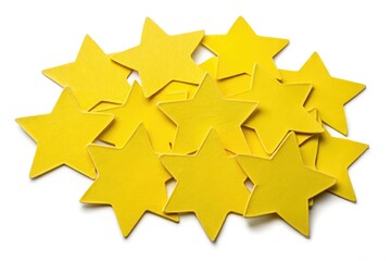 Fototapeta premium Vibrant yellow star-shaped paper stickers, isolated against a white background, suitable for crafting projects. Enhance your artistic endeavors with these cheerful and versatile labels.