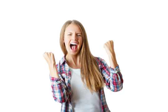 A young woman in a plaid shirt celebrating with fists raised, isolated on a white background, representing joy and success