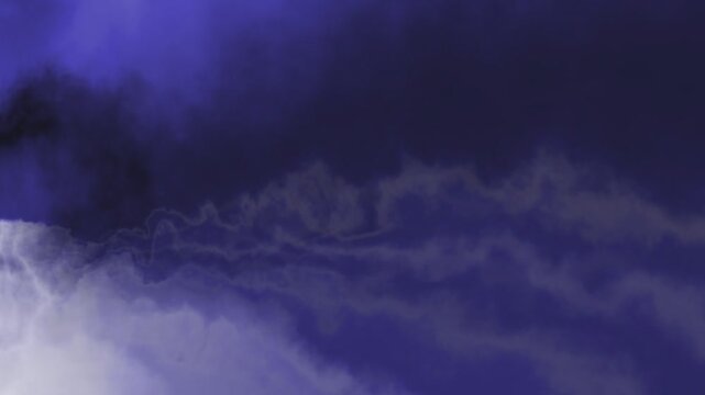 HD seamless looping animation of blue black background white clouds