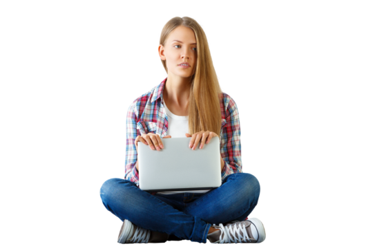 Woman with long hair holding a laptop, sitting cross-legged. Isolated on a white background. Concept of technology and relaxation