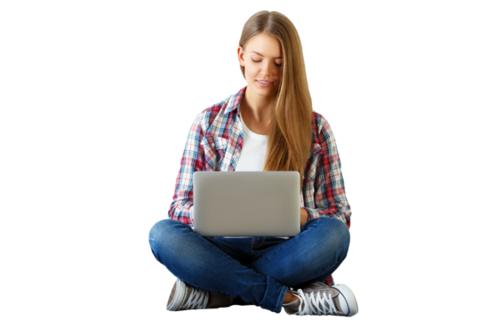 Woman sitting cross-legged using a laptop, wearing casual clothes, isolated on a white background, concept of technology and relaxation
