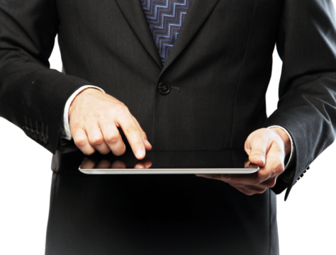 Businessman in a suit using a tablet, focused on his hands. Captured on a white background, illustrating technology in business