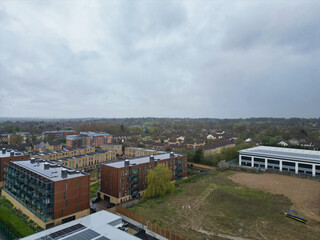 Fototapeta premium Aerial View of Central City Centre Elstree Uxbridge London City of England, Great Britain. It Was Rainy and Cloudy Day with Strong Winds over England, High Angle Drone's Camera Footage. April 4th, 24