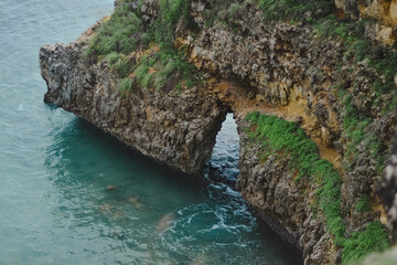 beautifull hole in the cliff around the coast